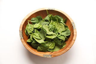 Round bowl full of spinach