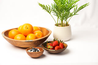 Round bowls full of fruit 